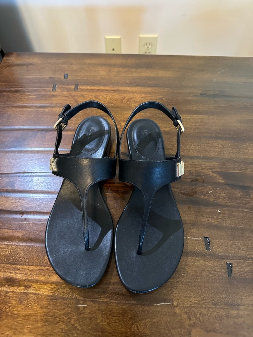 Michael Kors Black T-Strap Sandals with Gold Buckle